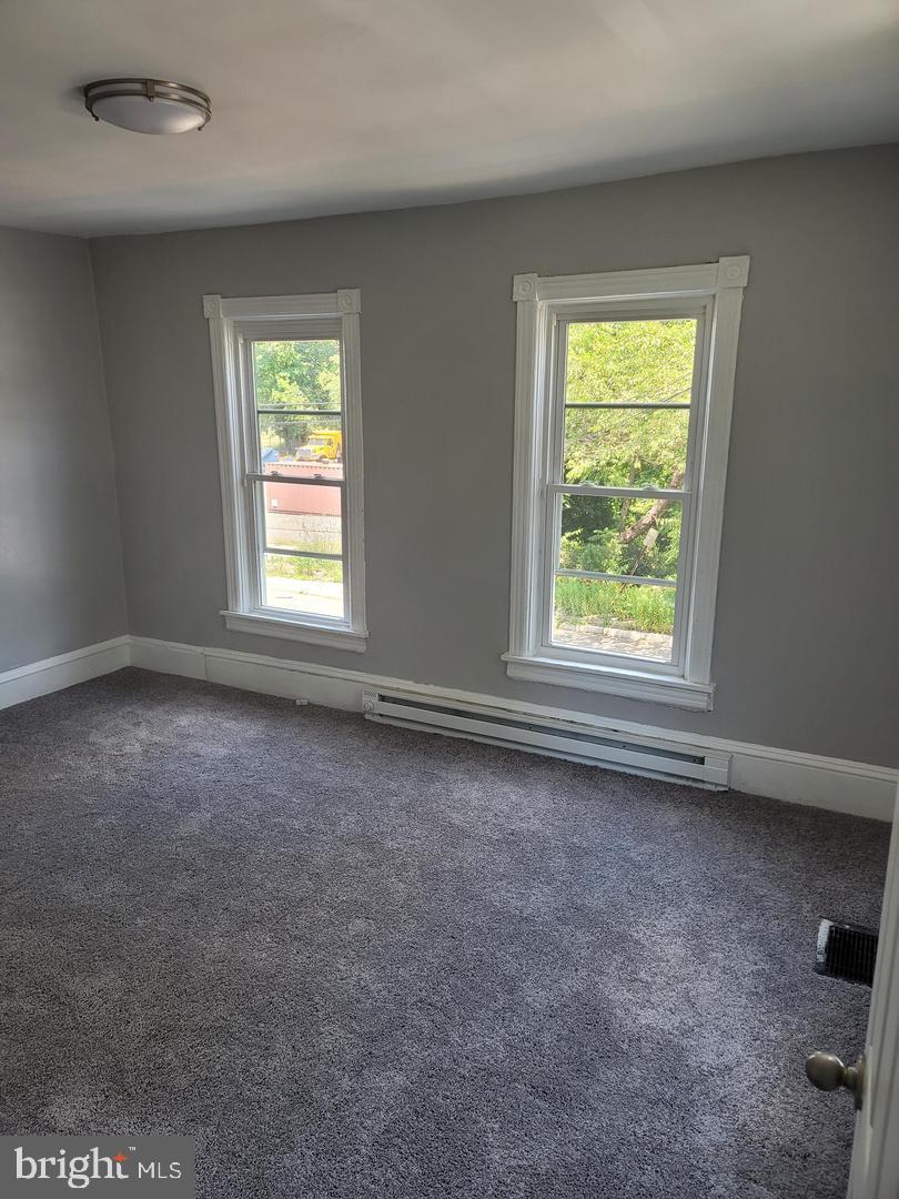 212 Rancocas Road Mount Holly, NJ 08060 - Photo 20 of 27 an empty room with a window