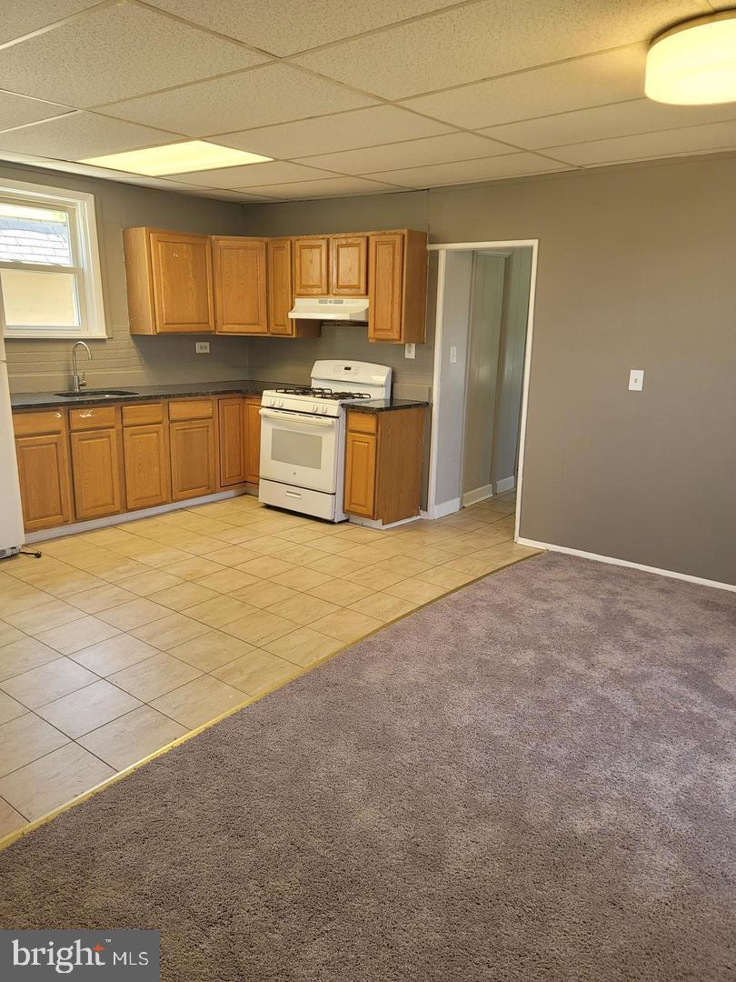 212 Rancocas Road Mount Holly, NJ 08060 - Photo 4 of 27 a view of a kitchen with a sink