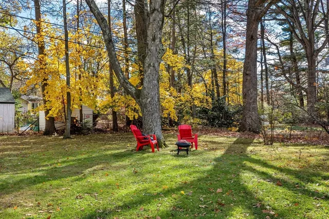 a kitchen with stainless steel appliances a sink stove and cabinets