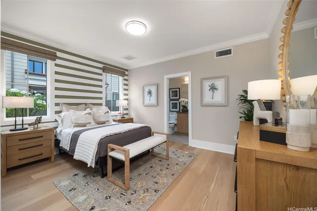 a bedroom with a bed and a dresser