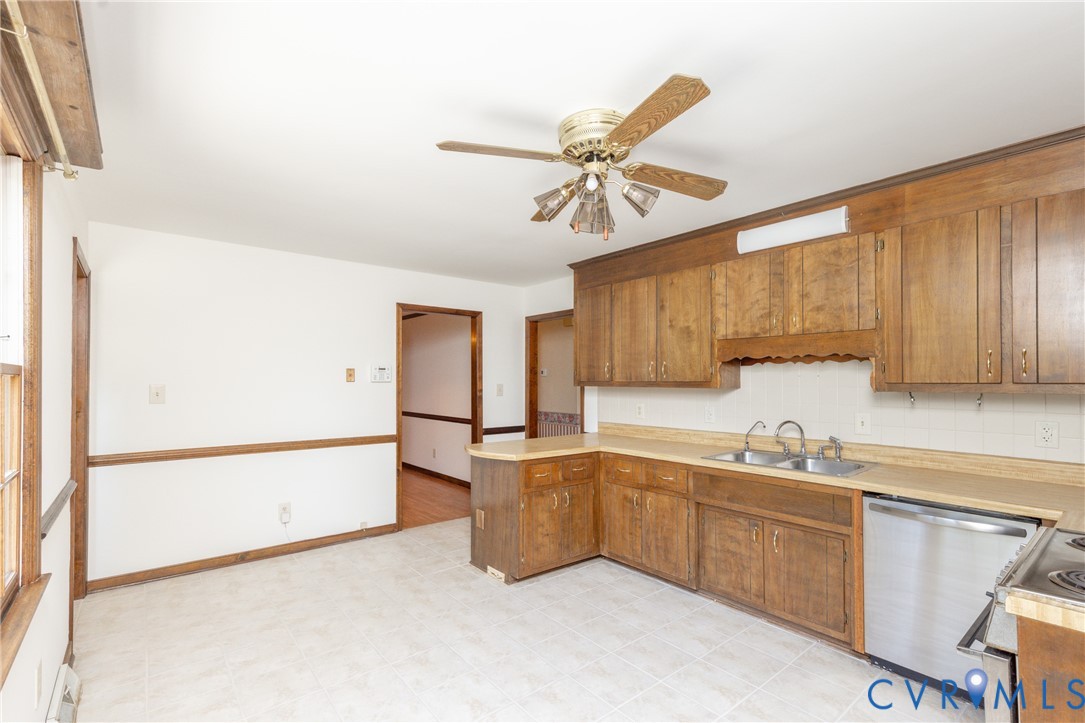 617 Rebel Ridge Road Colonial Heights, VA 23834 - Photo 19 of 49 a kitchen with a sink appliances and cabinets
