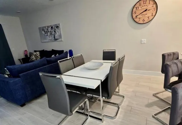 a view of a dining room with furniture