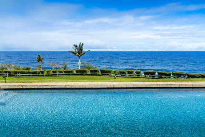 28-3628 Hawaiʻi Belt Road Honomu, HI 96728 - Photo 10 of 30 a view of swimming pool with a yard