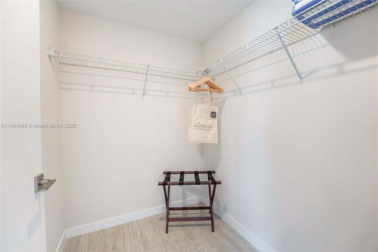 3900 Biscayne Boulevard, Unit S702 Miami, FL 33137 - Photo 8 of 12 a bathroom with a bathtub and a shower