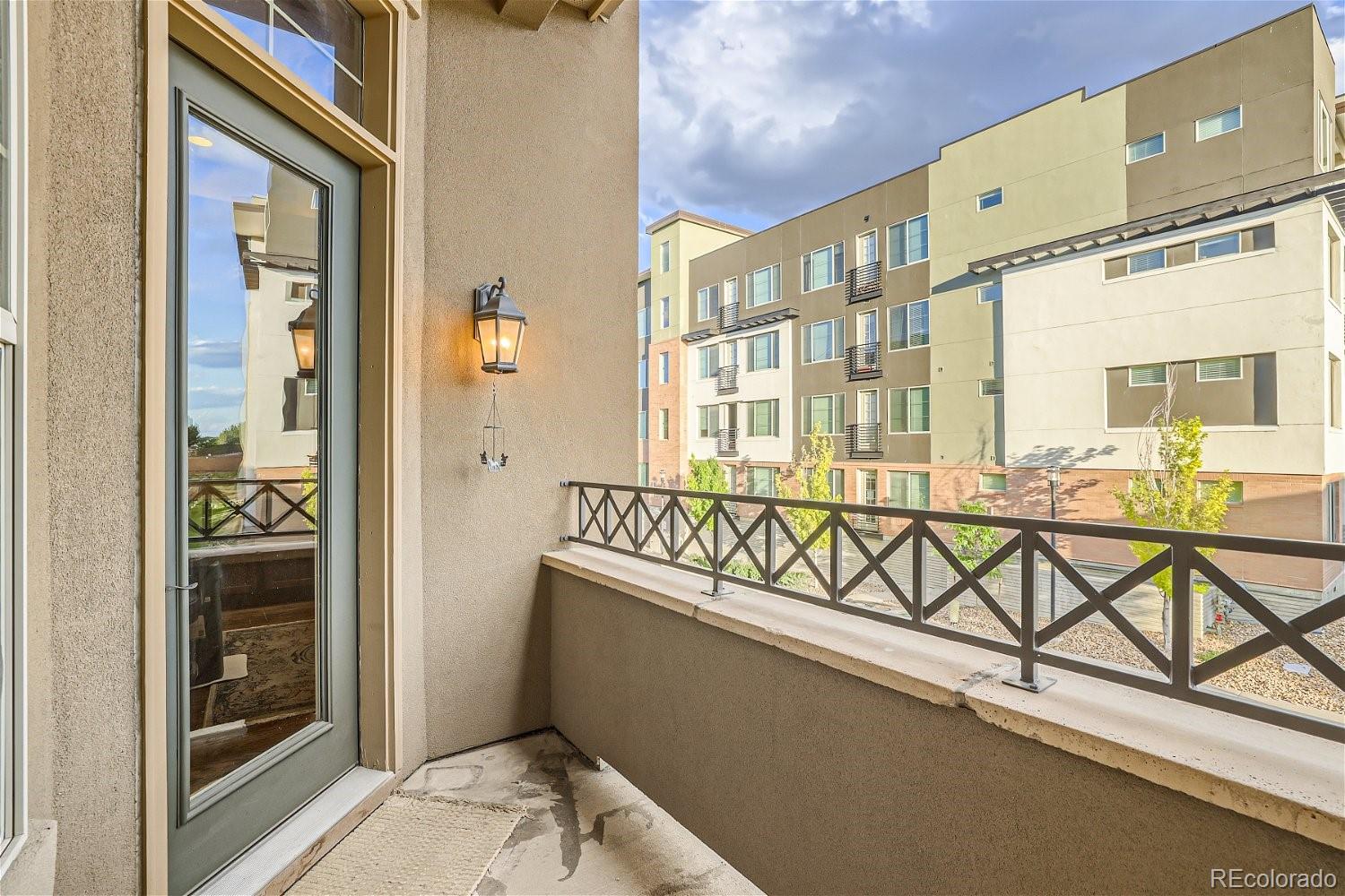 10104 Inverness Main Street Englewood, CO 80112 - Photo 15 of 34 a view of a balcony and chairs