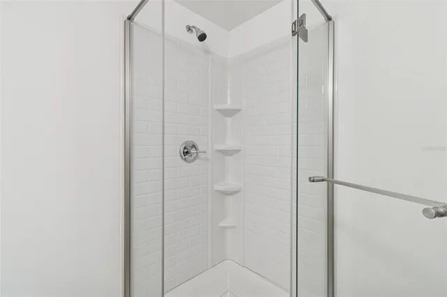 a bathroom with a sink toilet and a mirror