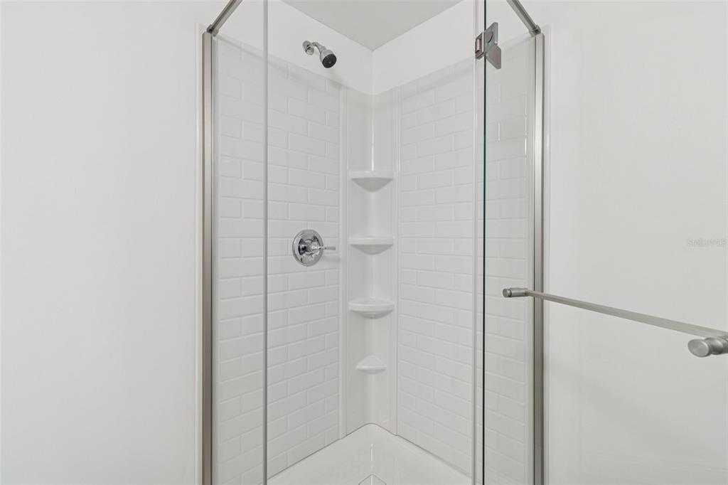 2900 49th Street North St. Petersburg, FL 33710 - Photo 19 of 52 a bathroom with a shower