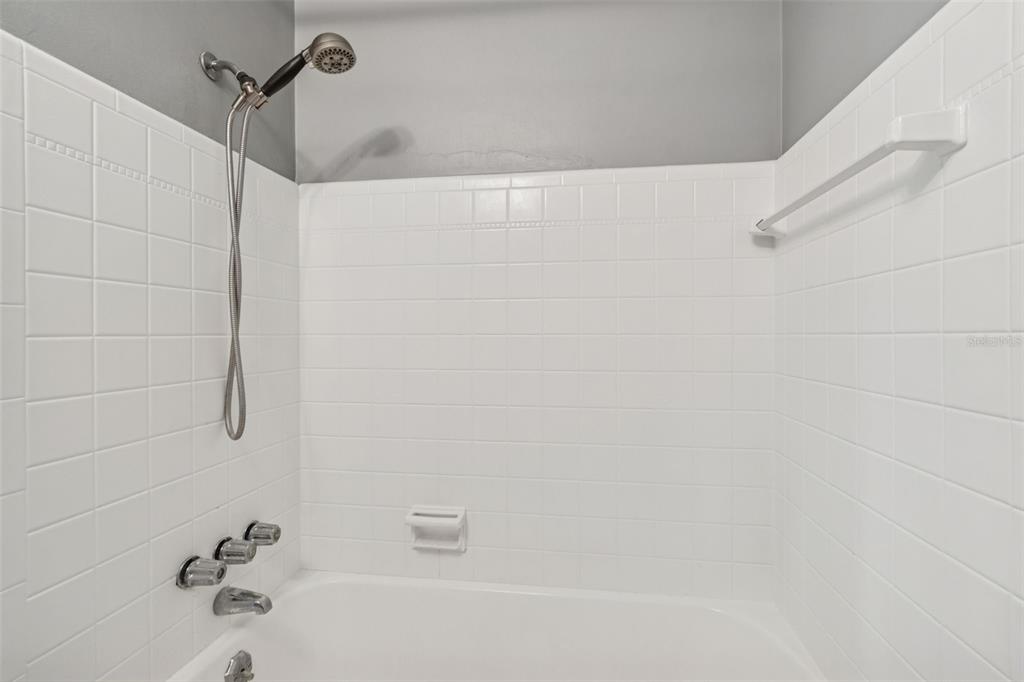 2900 49th Street North St. Petersburg, FL 33710 - Photo 26 of 52 a bathroom with a bathtub