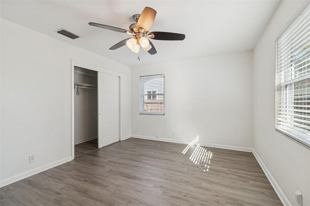 2900 49th Street North St. Petersburg, FL 33710 - Photo 29 of 52 a view of empty room with wooden floor and fan