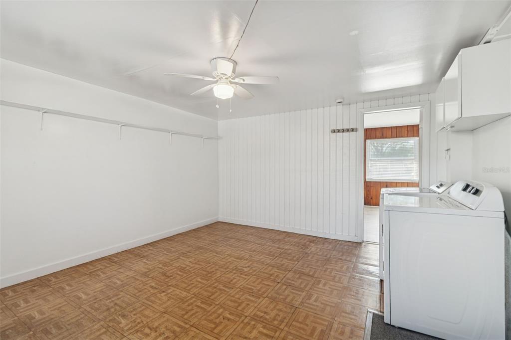 2900 49th Street North St. Petersburg, FL 33710 - Photo 37 of 52 wooden floor in an empty room with a window