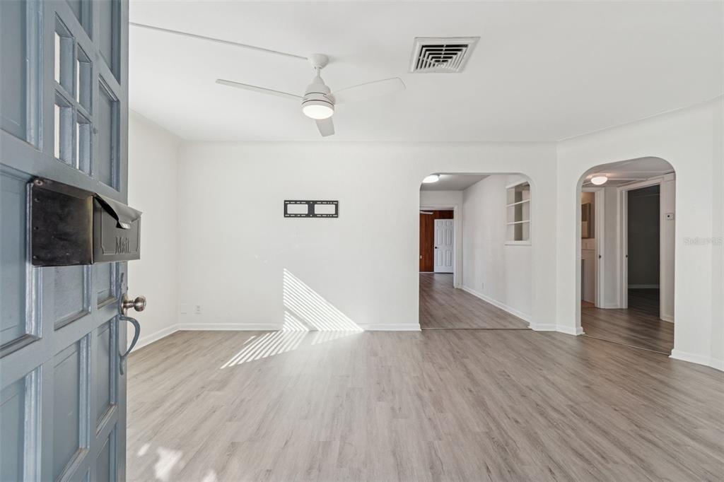 2900 49th Street North St. Petersburg, FL 33710 - Photo 6 of 52 a view of a livingroom with wooden floor
