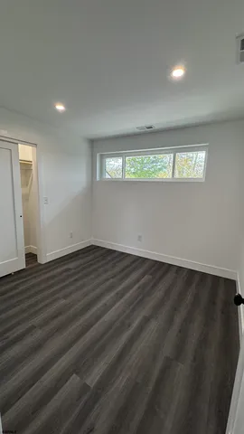 a bathroom with a sink toilet and vanity