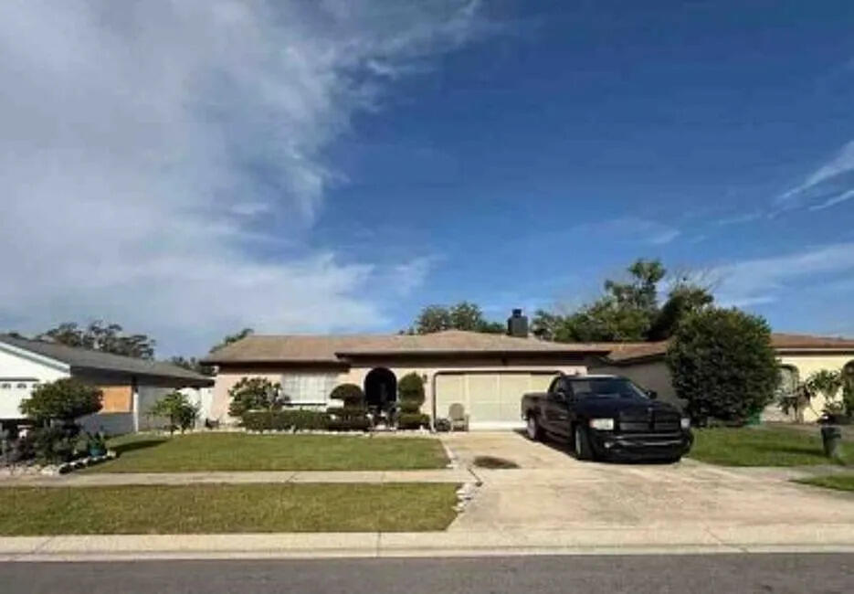 1644 East Grovehill Road Palm Harbor, FL 34683 - Photo 1 of 3 1 - 1644 E Grovehill Rd