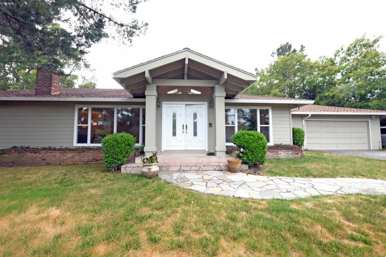1555 Hayne Road Hillsborough, CA 94010 - Photo 1 of 1 a front view of a house with a yard