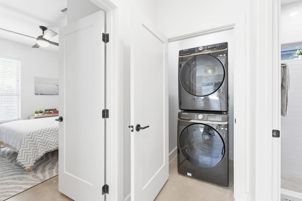 3112 Powell Circle Austin, TX 78704 - Photo 12 of 27 Laundry area with stacked washer / dryer and a ceiling fan