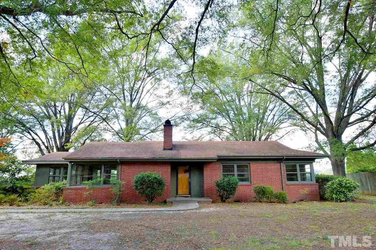 313 Loop Road Garner, NC 27529 - Photo 1 of 12 front view of a house with a yard