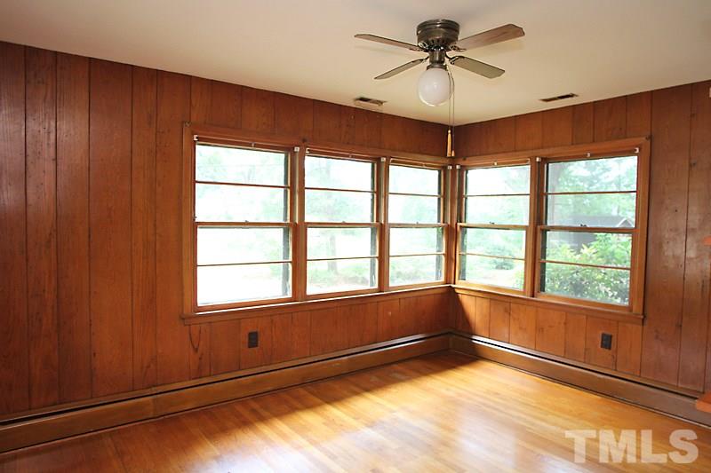 313 Loop Road Garner, NC 27529 - Photo 5 of 12 a view of an empty room with a window