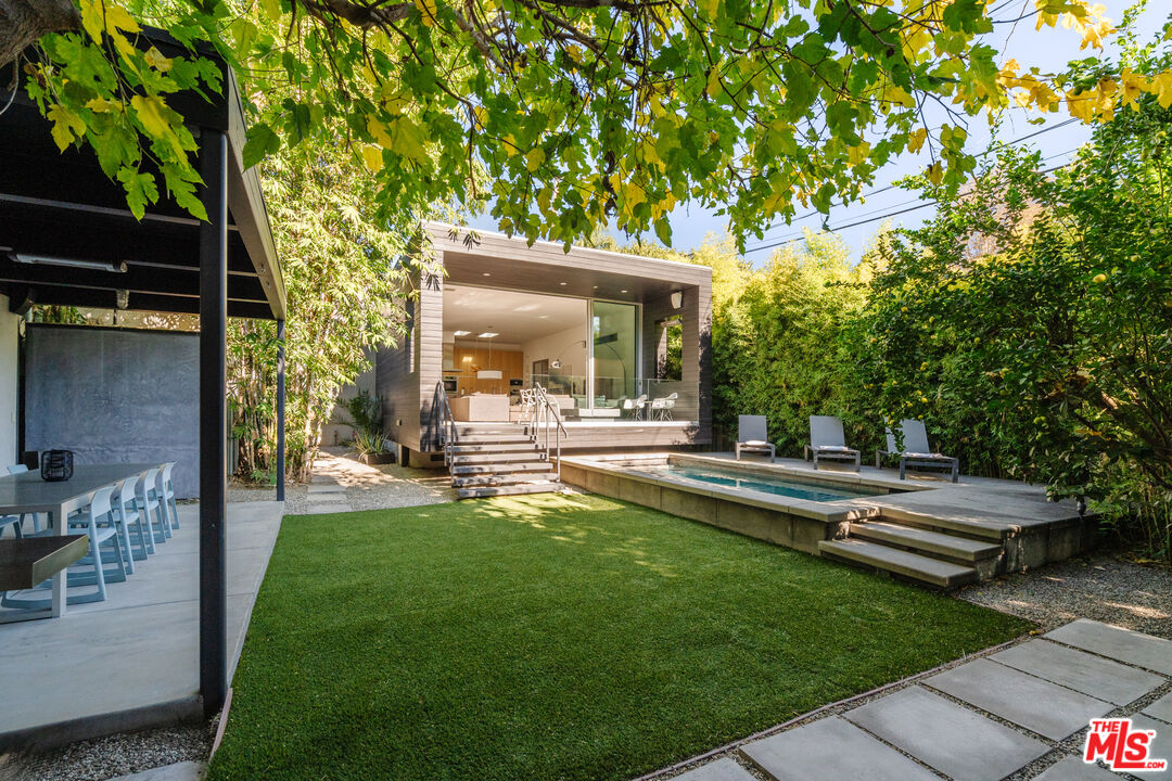 8570 Rugby Drive West Hollywood, CA 90069 - Photo 1 of 35 a view of house with backyard outdoor seating and hardwood
