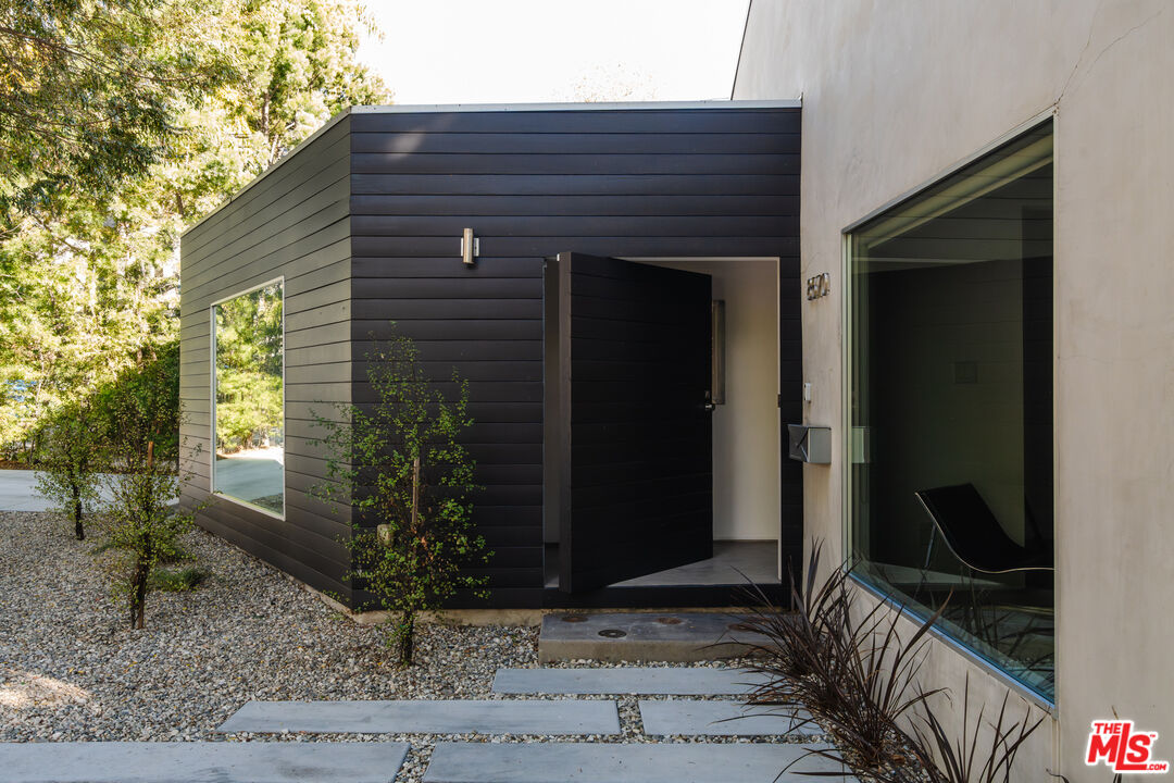 8570 Rugby Drive West Hollywood, CA 90069 - Photo 2 of 35 a front view of a house