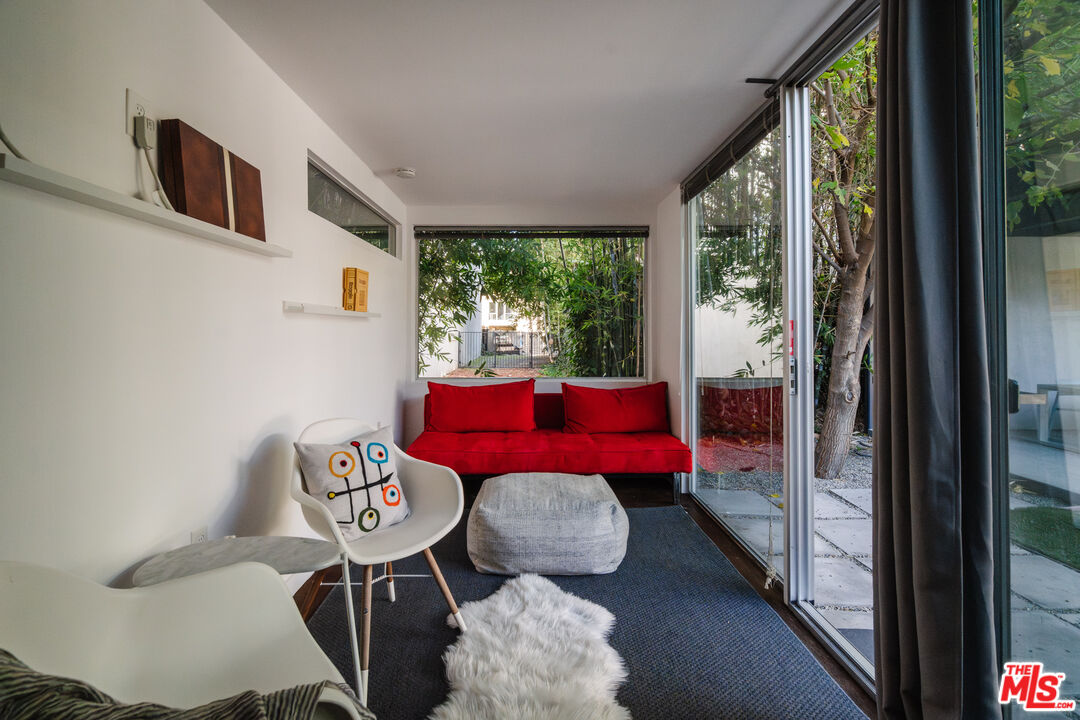 8570 Rugby Drive West Hollywood, CA 90069 - Photo 32 of 35 a view of a dining room with furniture window and outside view