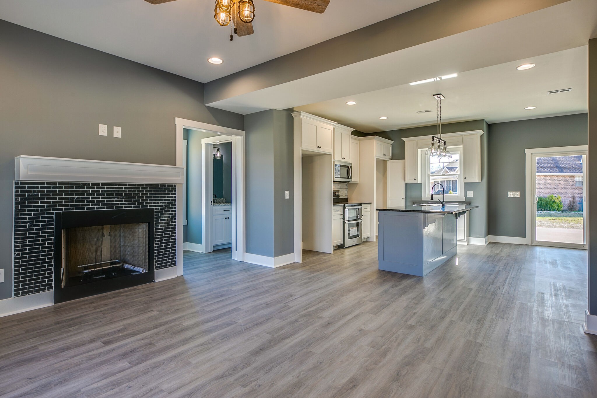42 Post Road Manchester, TN 37355 - Photo 11 of 43 a view of kitchen with cabinets and wooden floor