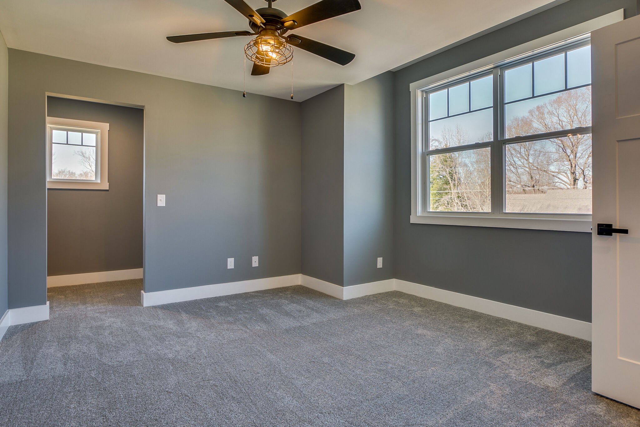 42 Post Road Manchester, TN 37355 - Photo 27 of 43 an empty room with windows and fan