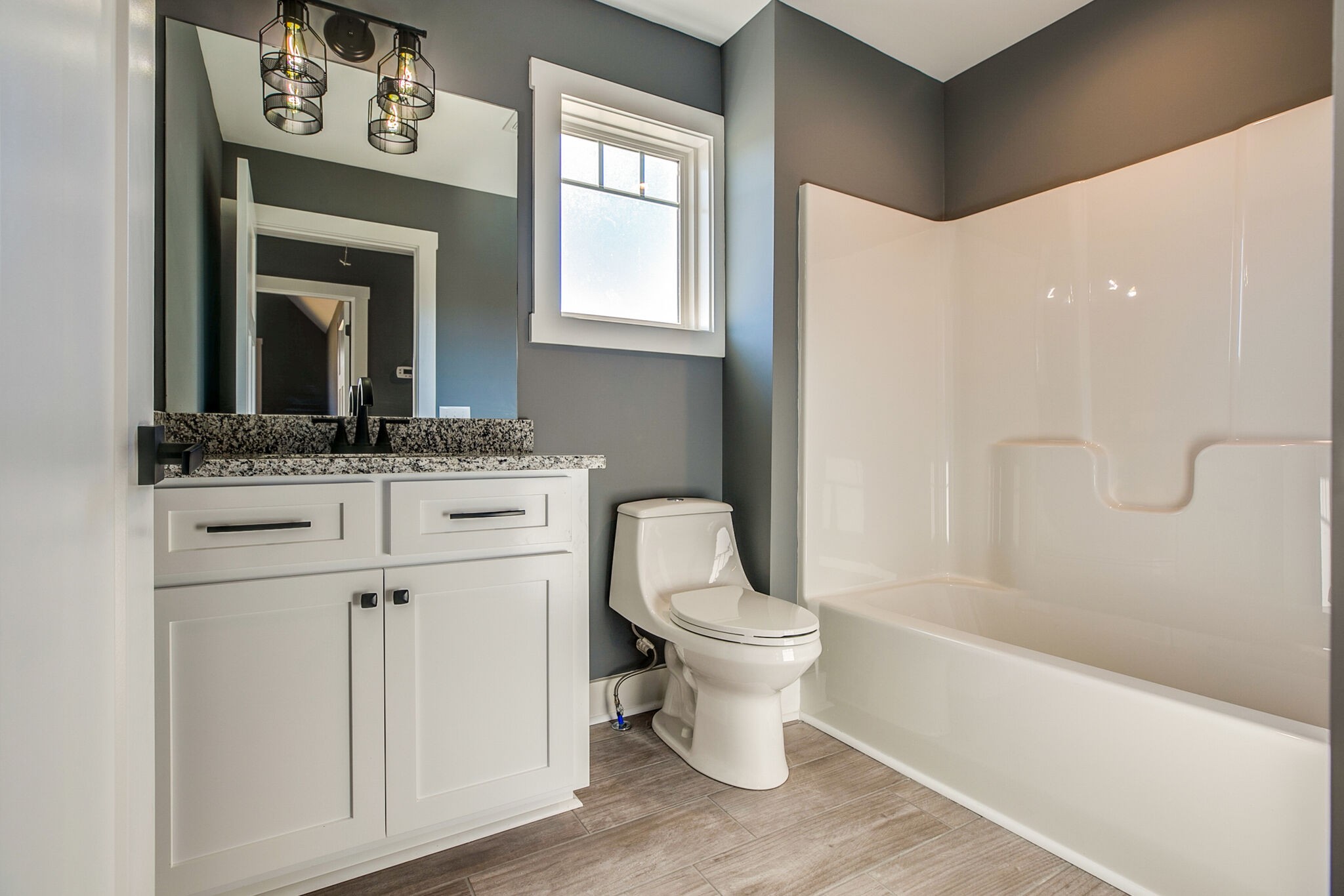 42 Post Road Manchester, TN 37355 - Photo 31 of 43 a bathroom with a sink a toilet and shower