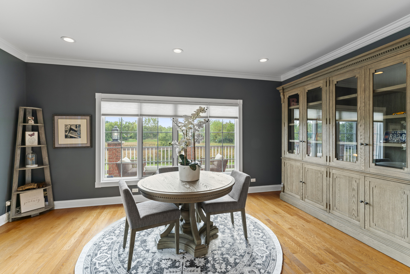 121 Florence Road Inverness, IL 60010 - Photo 13 of 54 a view of a dining room with furniture window and wooden floor