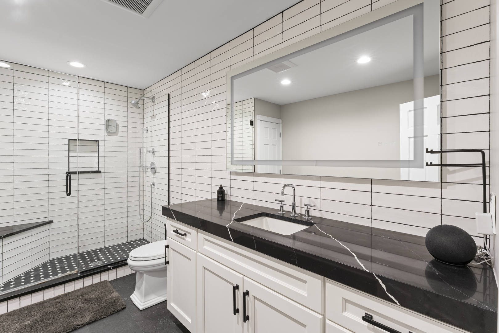 121 Florence Road Inverness, IL 60010 - Photo 22 of 54 a bathroom with a double vanity sink toilet and mirror