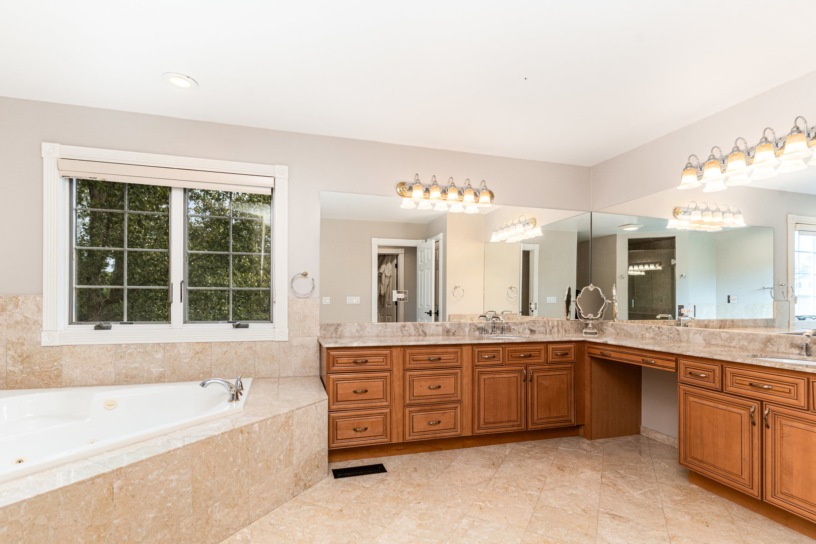 121 Florence Road Inverness, IL 60010 - Photo 35 of 54 a large bathroom with a large tub and sink