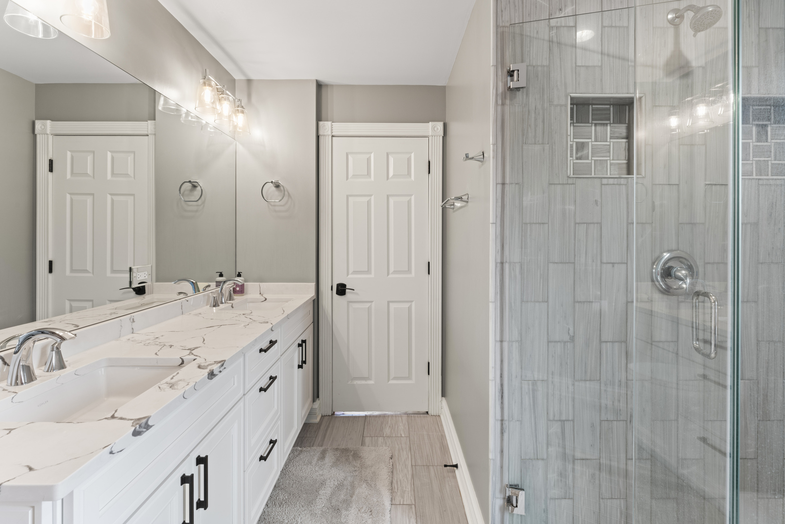 121 Florence Road Inverness, IL 60010 - Photo 47 of 54 a bathroom with a double vanity sink and mirror