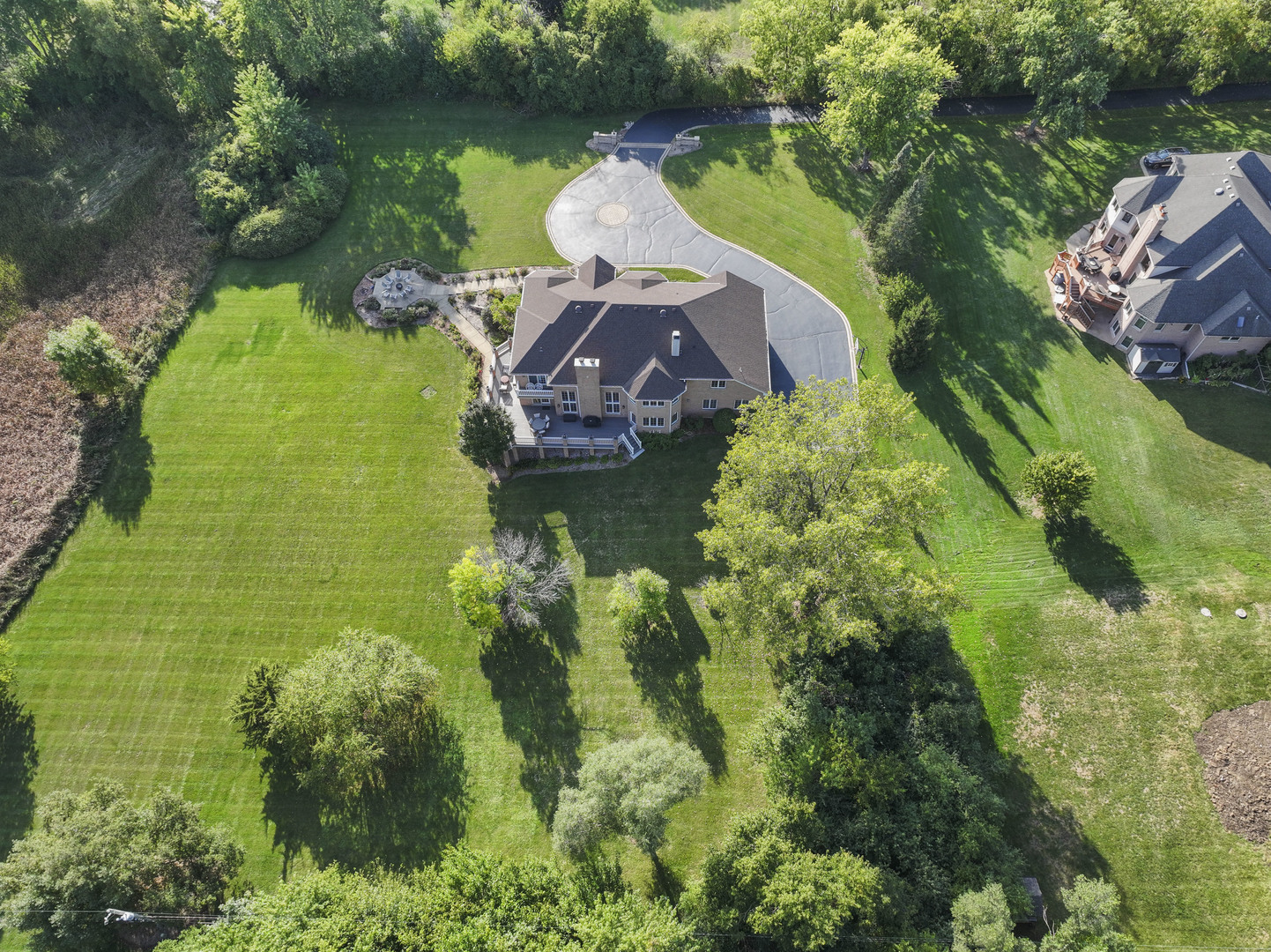 121 Florence Road Inverness, IL 60010 - Photo 50 of 54 an aerial view of a house with a garden and lake view