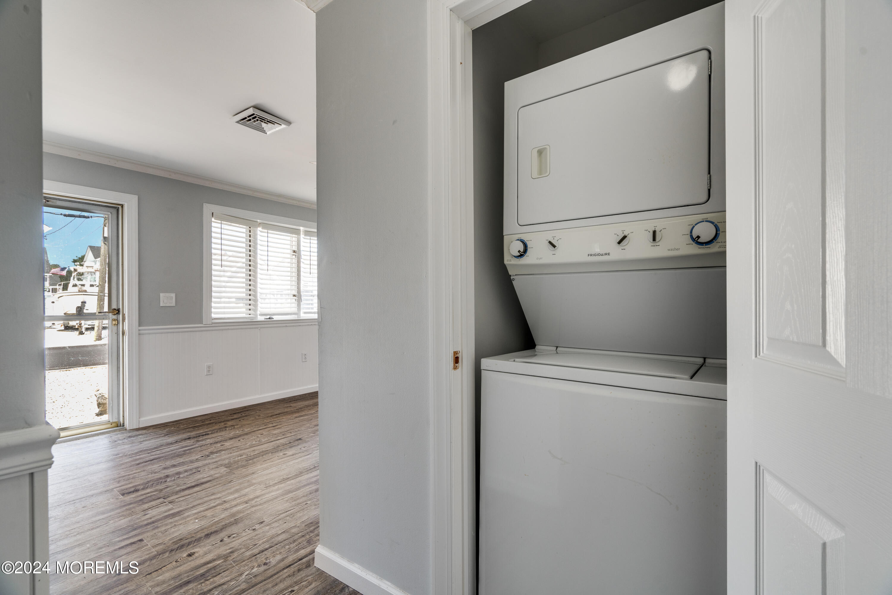 14 Bayview Drive Waretown, NJ 08758 - Photo 23 of 35 a view of washer and dryer with wooden floor
