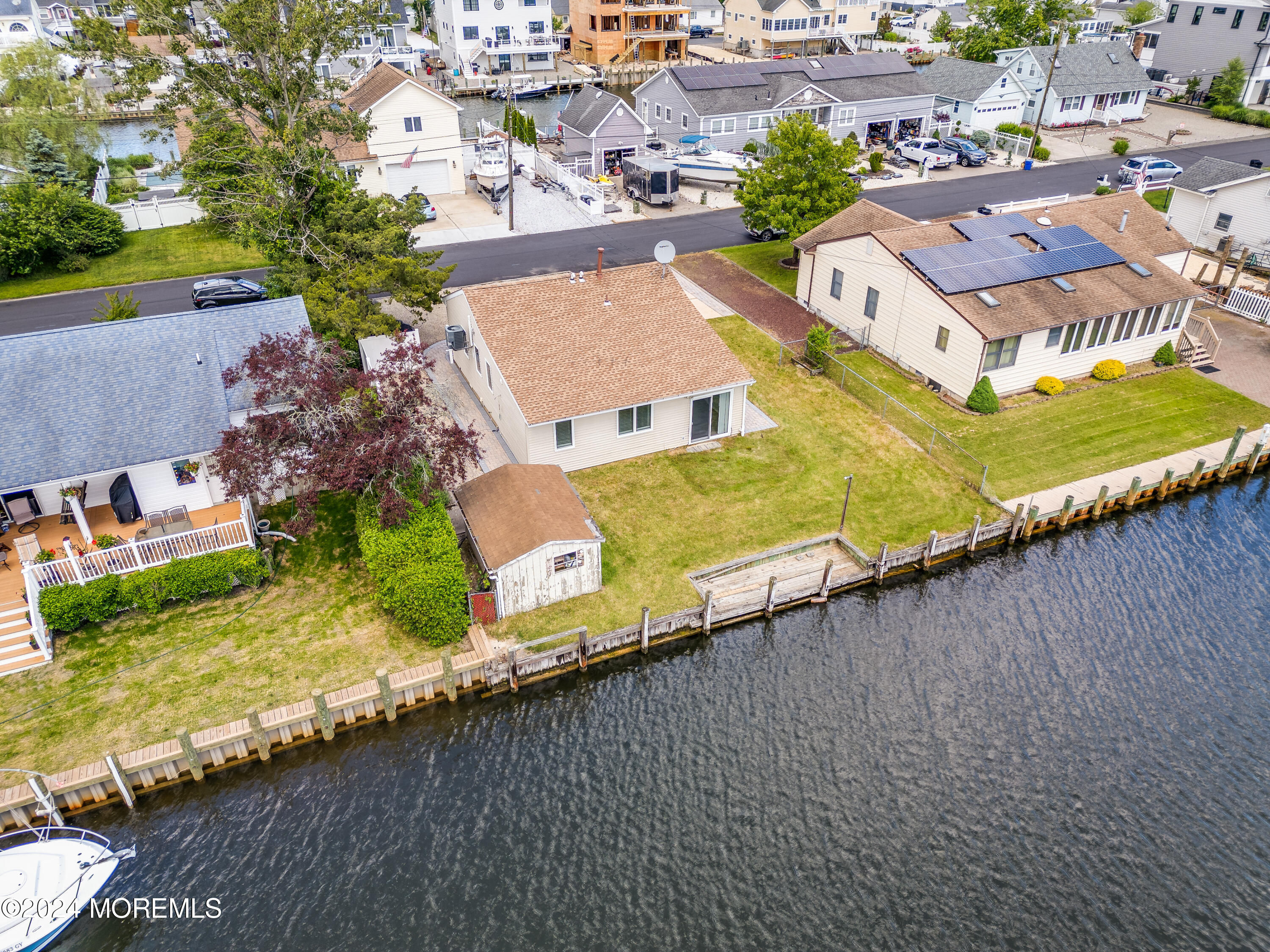 14 Bayview Drive Waretown, NJ 08758 - Photo 26 of 35 an aerial view of residential houses with outdoor space and parking