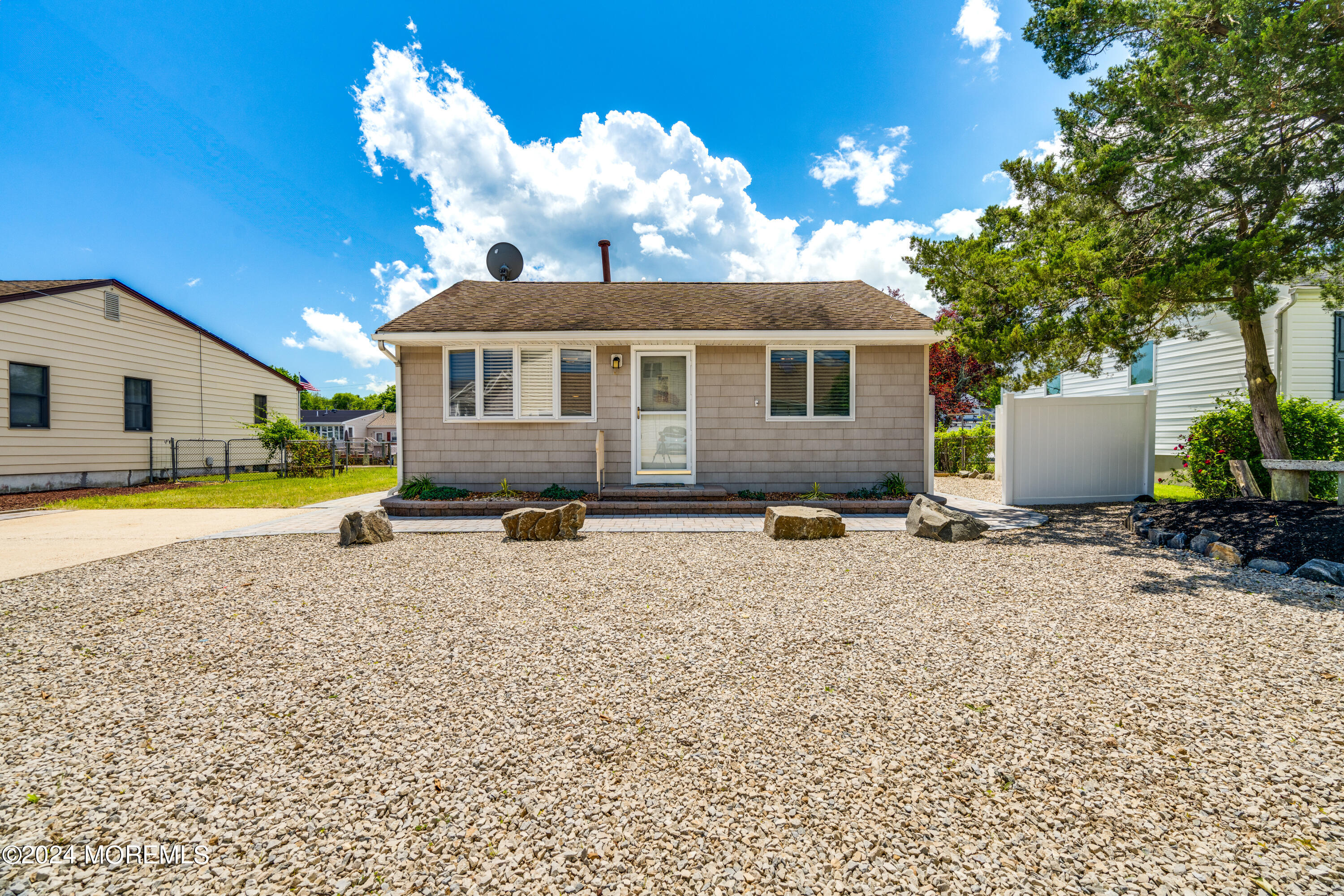 14 Bayview Drive Waretown, NJ 08758 - Photo 3 of 35 a house view with a swimming pool and a yard