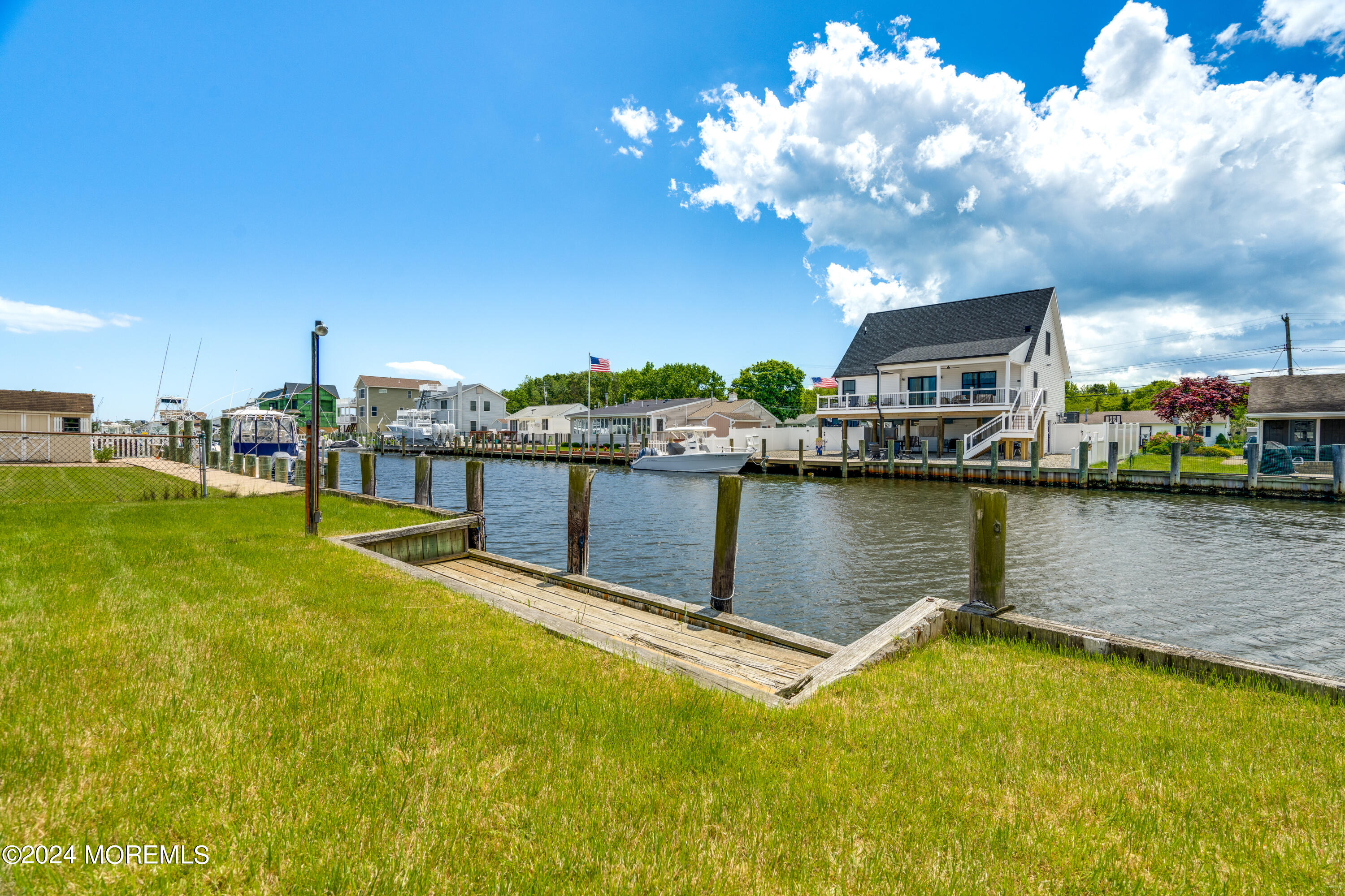14 Bayview Drive Waretown, NJ 08758 - Photo 5 of 35 a view of a lake with houses