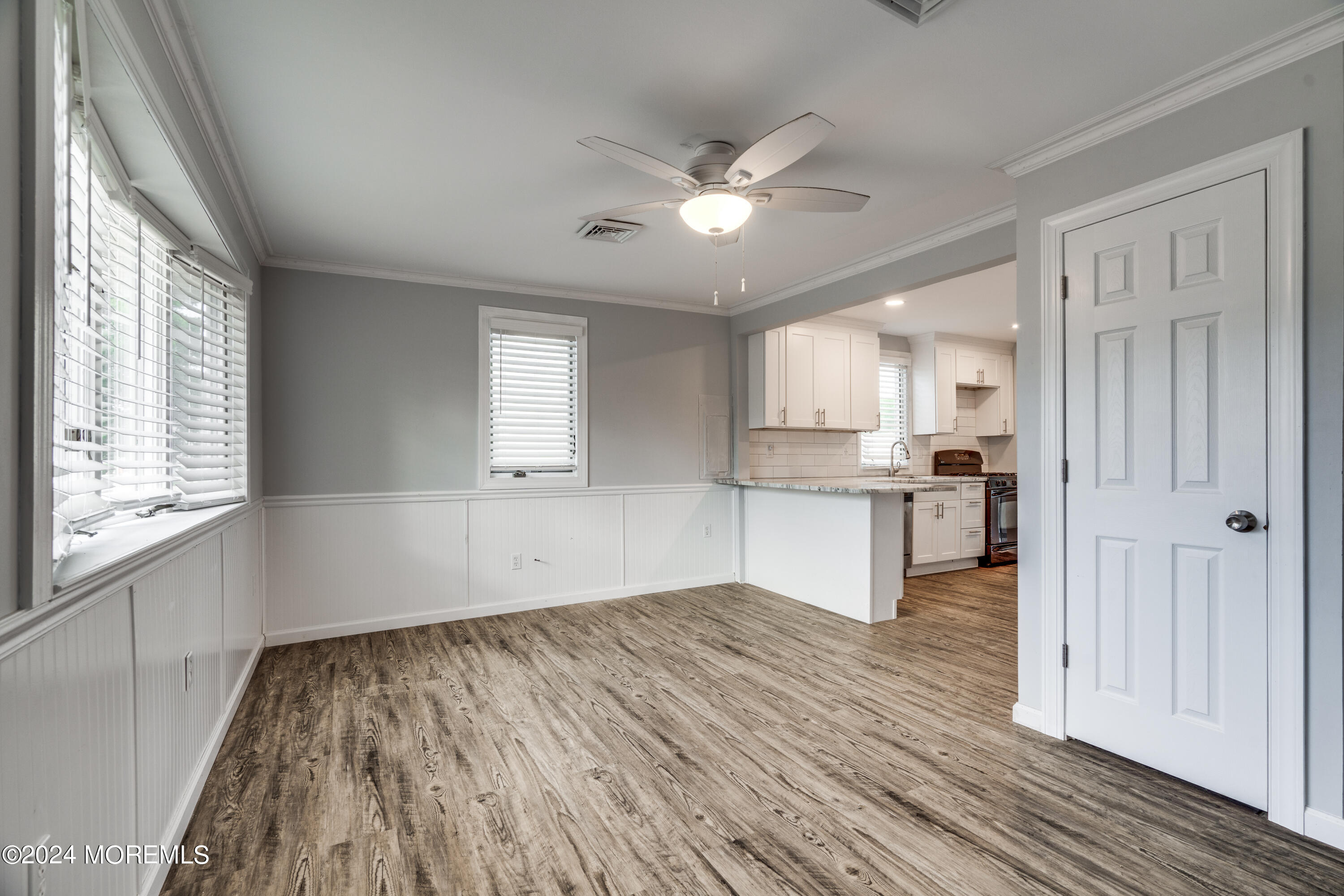 14 Bayview Drive Waretown, NJ 08758 - Photo 8 of 35 a view of kitchen with wooden floor electronic appliances and window