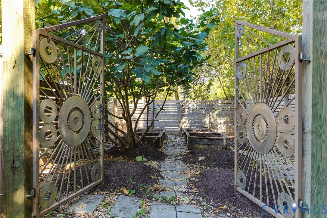 9712 Cherokee Road Richmond, VA 23235 - Photo 48 of 50 Private fenced garden with Artist's gates