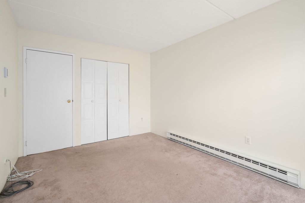 190 High Street, Unit 409 Medford, MA 02155 - Photo 19 of 30 a view of a room with an empty space