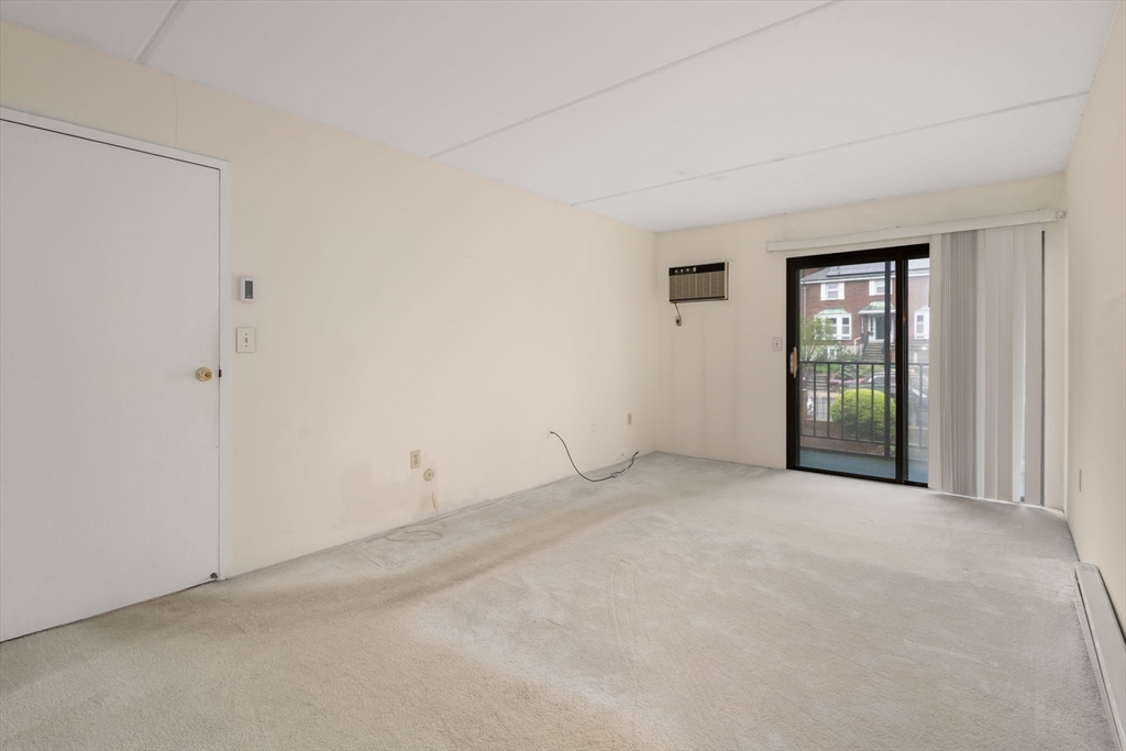 190 High Street, Unit 409 Medford, MA 02155 - Photo 21 of 30 a view of an empty room with window