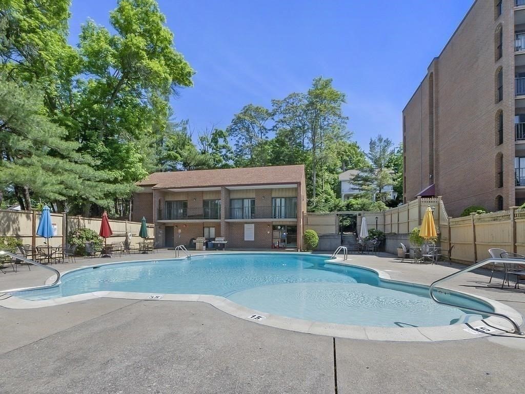 190 High Street, Unit 409 Medford, MA 02155 - Photo 26 of 30 a house view with a sitting space and garden