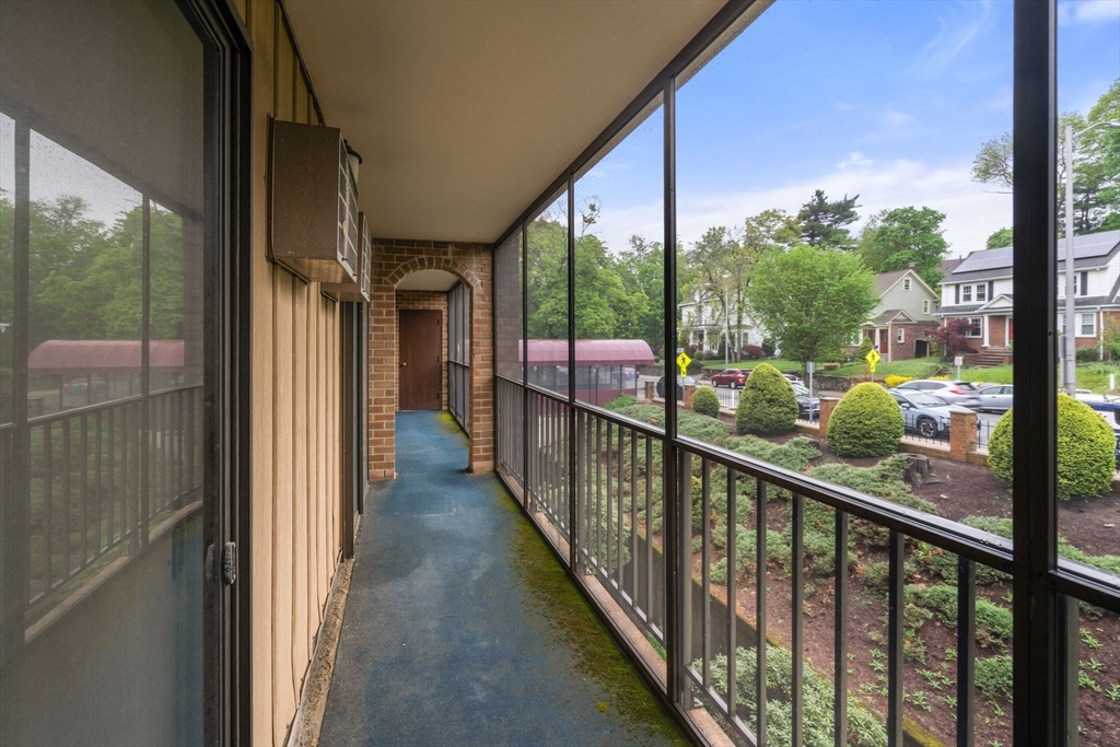190 High Street, Unit 409 Medford, MA 02155 - Photo 29 of 30 a view of a city from a balcony