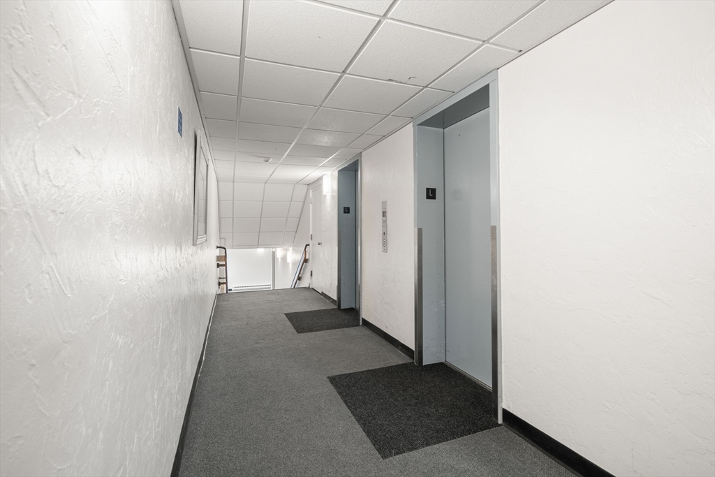 190 High Street, Unit 409 Medford, MA 02155 - Photo 7 of 30 a view of a hallway