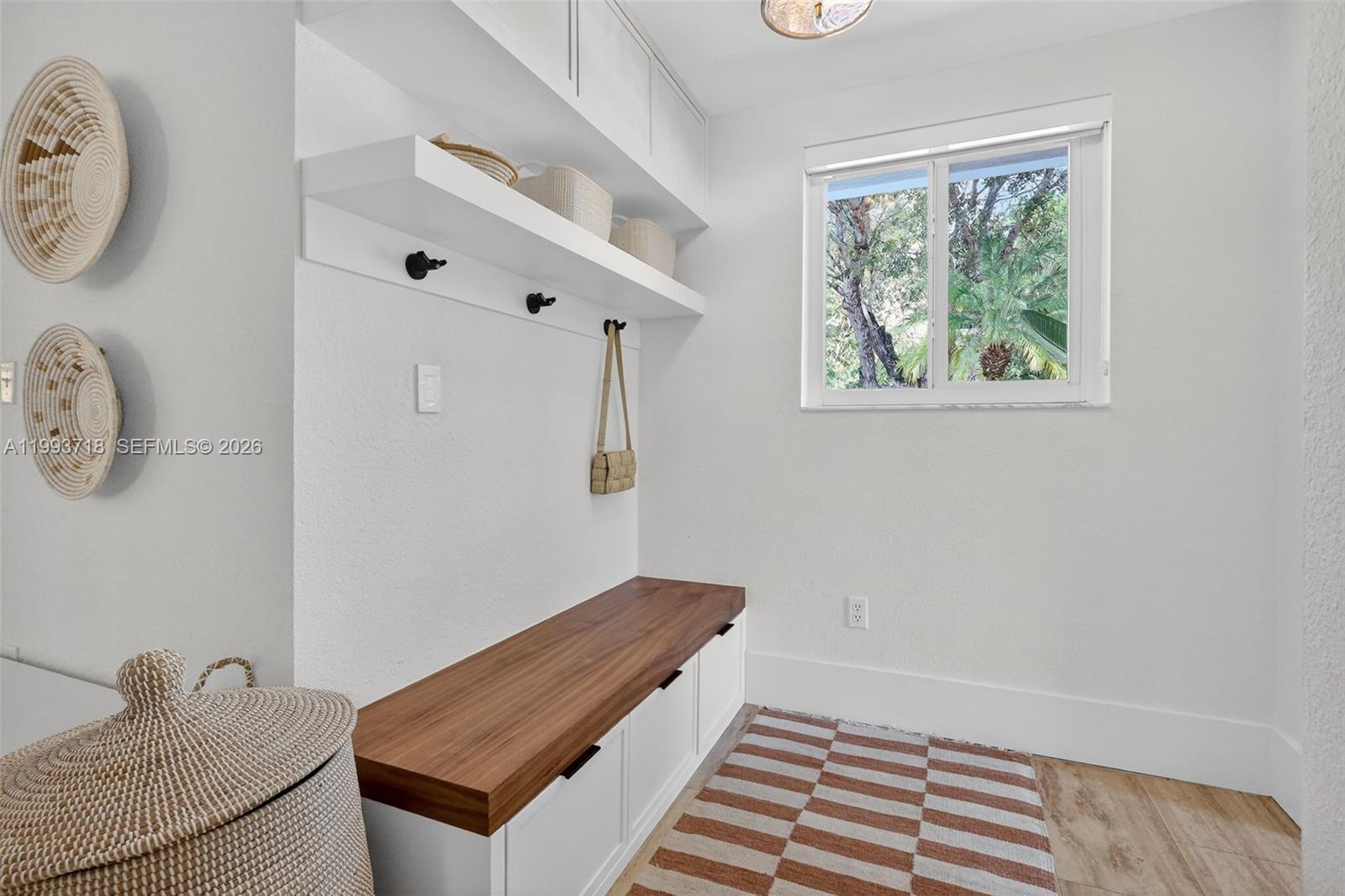 3258 Riviera Drive Coral Gables, FL 33134 - Photo 6 of 43 a view of a hallway with entryway