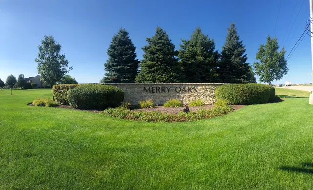 a view of a garden with an outdoor space