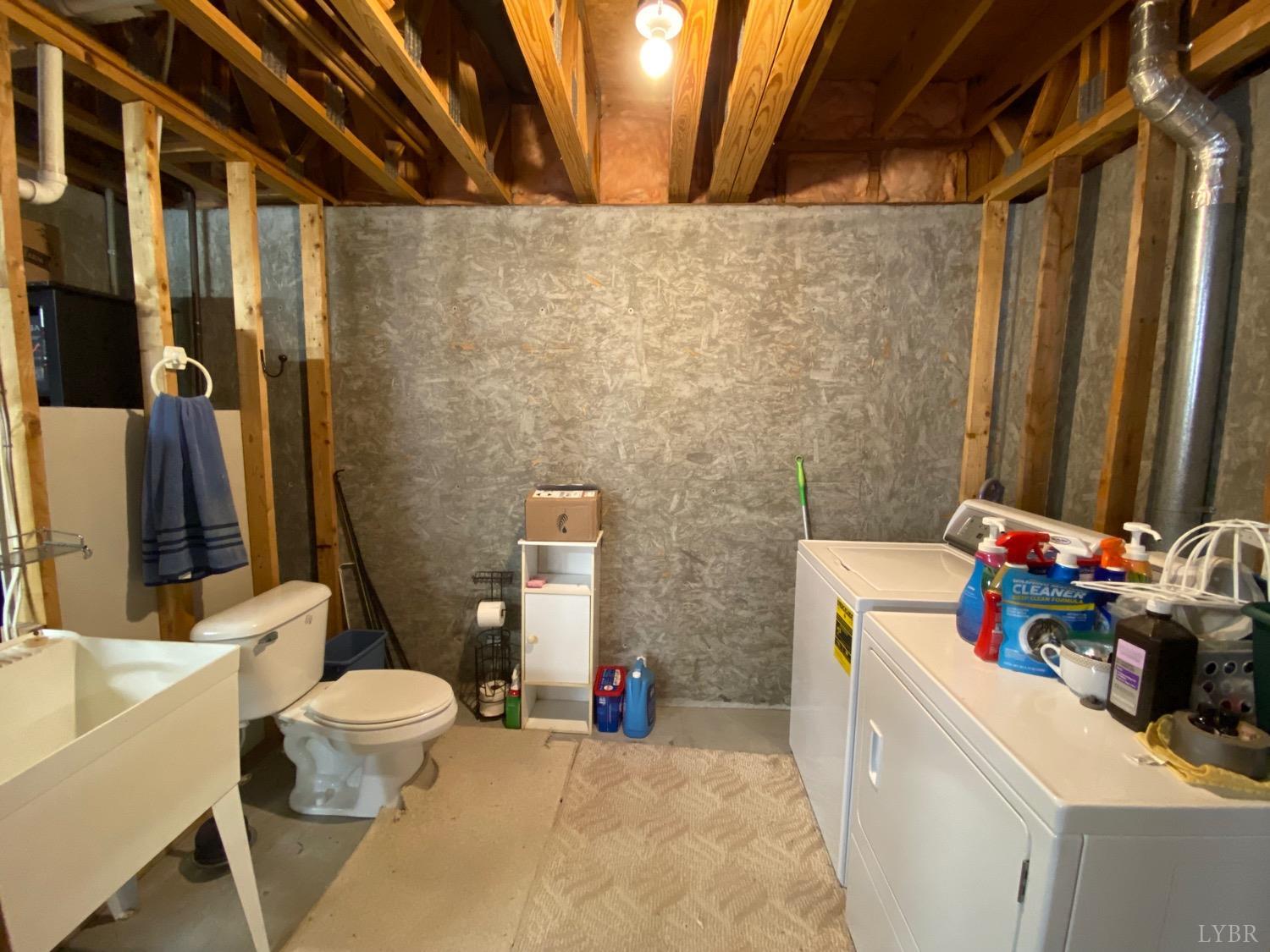 1149 Emmaus Church Road Moneta, VA 24121 - Photo 39 of 51 a bathroom with a sink toilet and shower