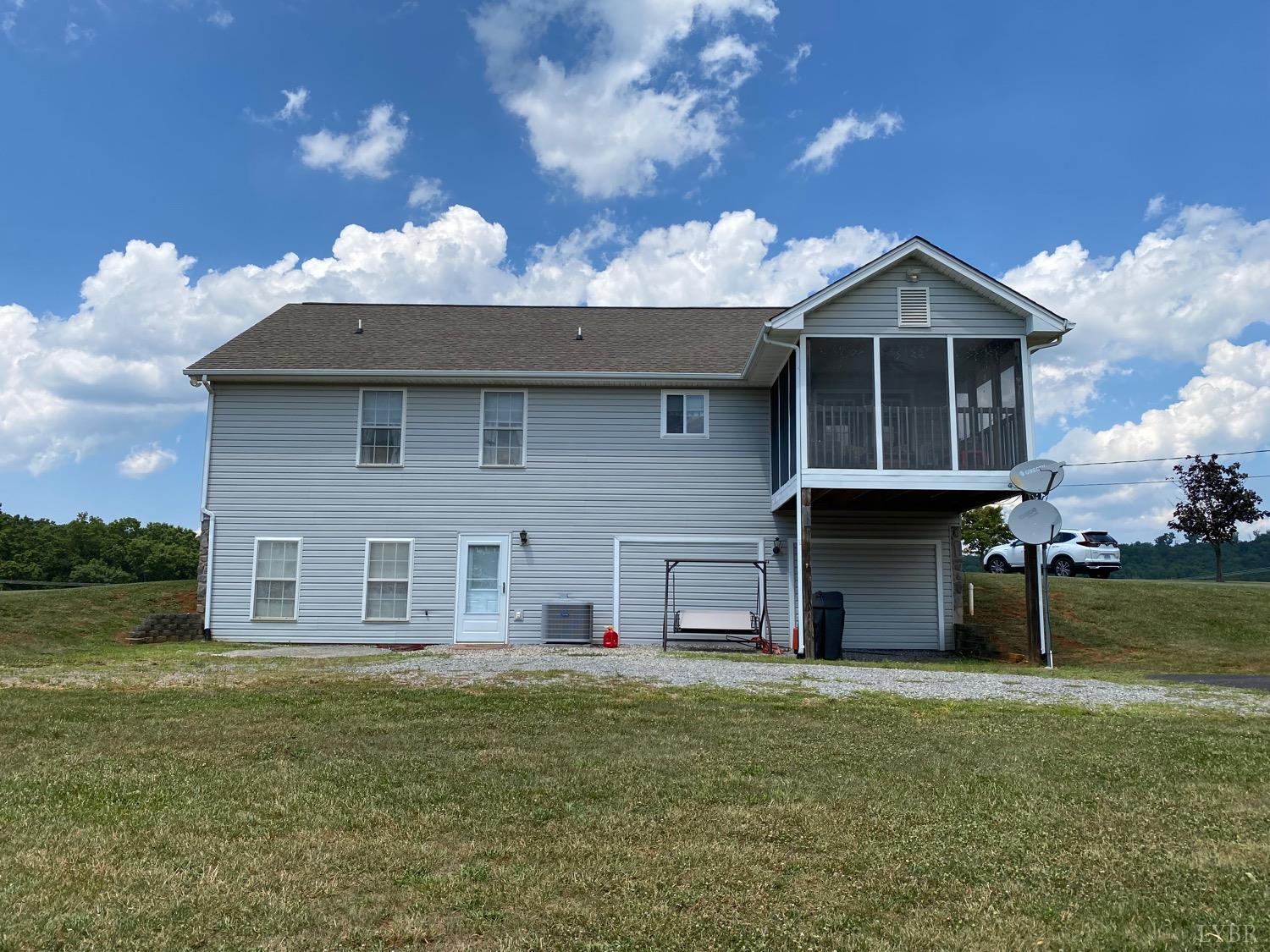 1149 Emmaus Church Road Moneta, VA 24121 - Photo 42 of 51 a view of a house with a yard