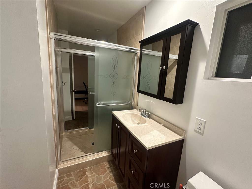 2065 Watson Street Glendale, CA 91201 - Photo 6 of 11 a bathroom with a sink vanity and mirror