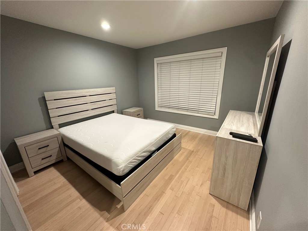 2065 Watson Street Glendale, CA 91201 - Photo 8 of 11 a bedroom with a bed and white cabinets