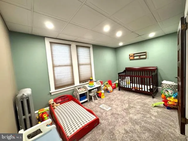 a bedroom with furniture and a bed